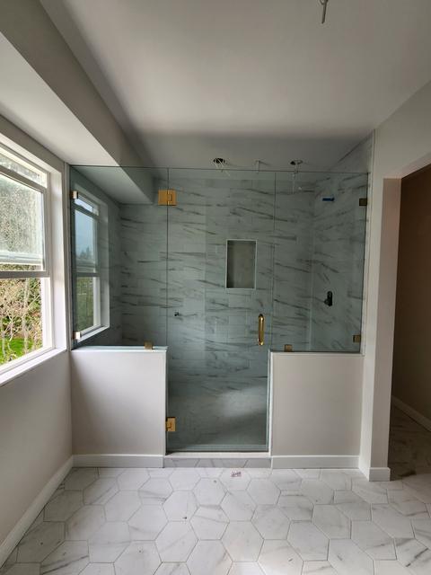 Door & panels on knee walls · Satin brass