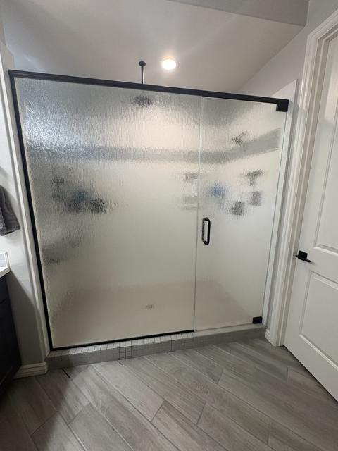Framed rain-glass door & panel · Matte black