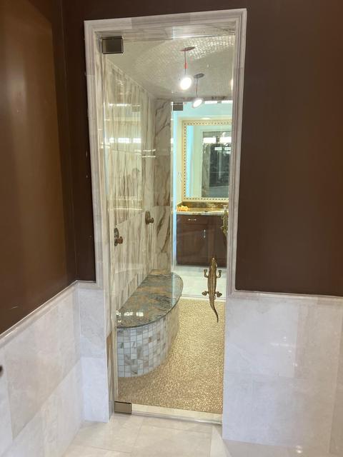 Floor-to-ceiling steam shower door