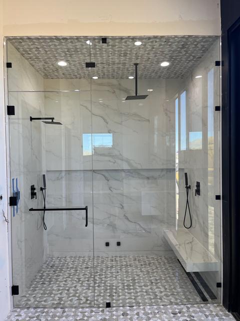 Steam enclosure to a tiled ceiling · Matte black